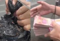 Foto tangkapan layar video viral penukaran uang terbakar 