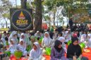 Komunitas Pengemudi All Kom DKI Jakarta Bersatu menggelar kegiatan santunan kepada anak yatim di kawasan Waduk Pluit, Jakarta Utara, Minggu (12/7/2026)