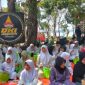 Komunitas Pengemudi All Kom DKI Jakarta Bersatu menggelar kegiatan santunan kepada anak yatim di kawasan Waduk Pluit, Jakarta Utara, Minggu (12/7/2026)